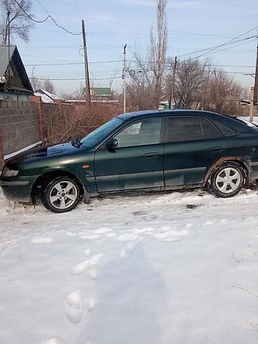 fard focus: Mazda 626: 1998 г., 1.8 л, Ручные, Бензин, Седан — 2