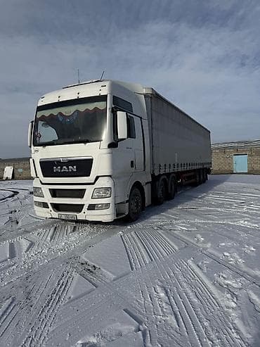 юуто трактор: Тягач, MAN, 2013 г., Тентованный — 6