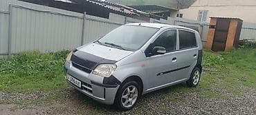 Daihatsu Cuore: 2004 г., 1 л, Механика, Бензин, Хэтчбэк
