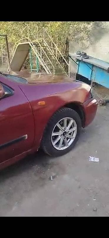 алтын казык ж м: Nissan Almera, седан, бордовый цвет. Основные особенности: - Кузов — 2