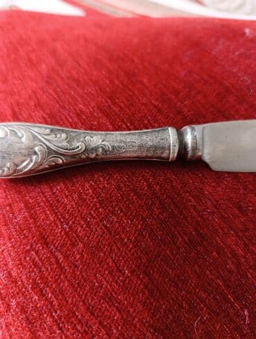 бабы растения: Это советский нож для масла с декоративной ручкой, предположительно — 1