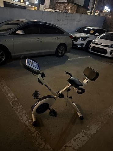 Складной велотренажёр HEAD с опорой для спины - Компактная X‑образная