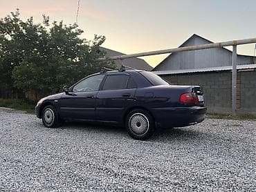 муссо автомобиль: Mitsubishi Carisma: 2000 г., Газ, Седан — 7