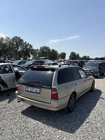 хунчи авто: Mitsubishi Lancer: 1995 г., Универсал — 4