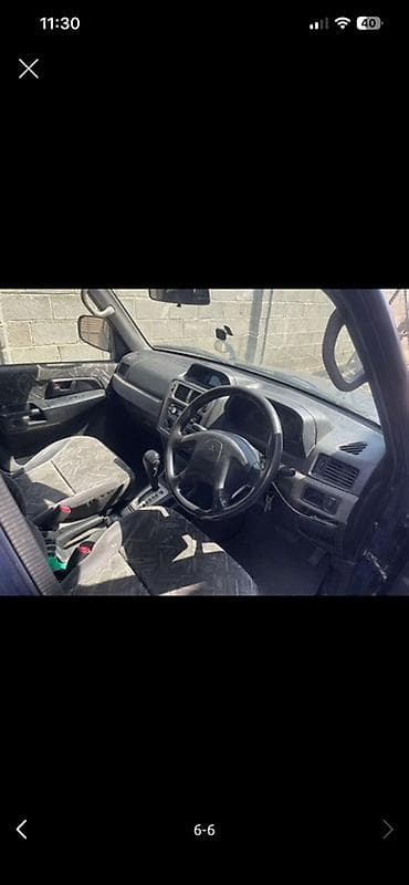 lada 2112: Mitsubishi Pajero iO: 1998 г., Автомат, Бензин, Внедорожник — 1