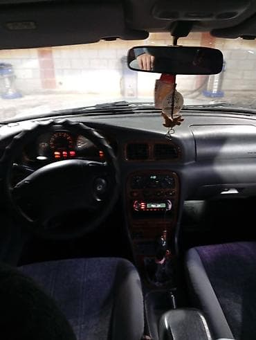 кубат: Kia Clarus: 2000 г., 2 л, Механика, Бензин, Седан — 6