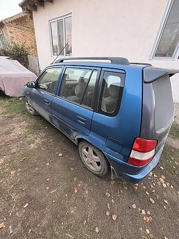 жеңил машина: Mazda Demio: 1998 г., 1.3 л, Кол менен иштөөчү, Бензин, Хетчбек — 5