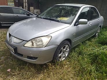 Транспорт: Mitsubishi Lancer: 2004 г., 1.6 л, Механика, Бензин, Седан — 2