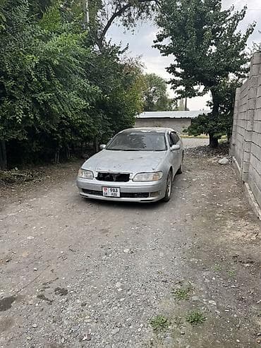 e38 bmw: Toyota Mark II: 1993 г., Автомат, Седан — 7