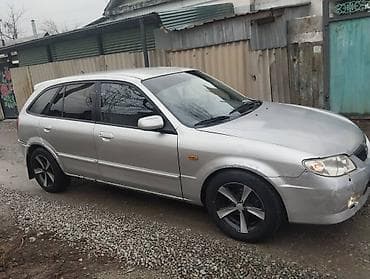 эо 3323: Mazda 323: 2003 г., Механика, Универсал — 2