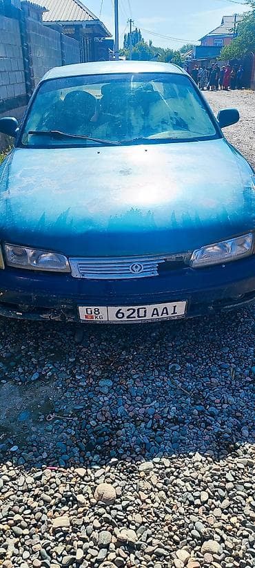 50 000: Mazda Cronos: 1992 г., 2 л, Бензин, Седан — 5