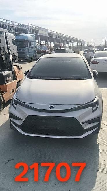 Продажа авто: Toyota Corolla: 2023 г., 1.8 л, Автомат, Гибрид, Седан — 2