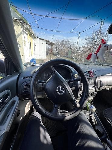 srv 2: Mazda 323: 2000 г., 2 л, Механика, Дизель, Хэтчбэк — 3