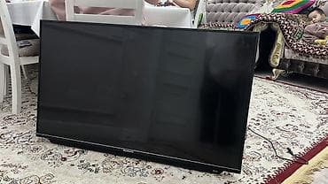 Телевизор Skyworth, диагональ около 50–55". Особенности: - Плоская