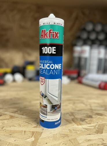 Универсальный силиконовый герметик Akfix 100E белого цвета