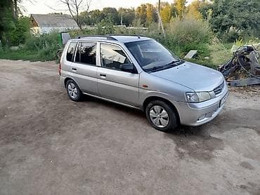 byd e2 2022: Mazda Demio: 2002 г., Механика, Бензин, Универсал — 1