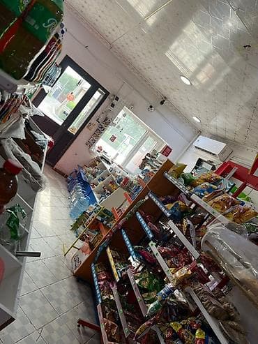 Недвижимость: Иштеп турган продуктовый магазин арендага берилет. Товары примерно — 2