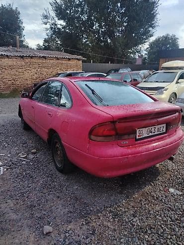 сары булун: Mazda 626: 1992 г., 2 л, Кол менен иштөөчү, Бензин, Хетчбек — 3