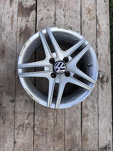 Транспорт: Комплект из 4 легкосплавных дисков Volkswagen. - Диаметр: 14" — 3