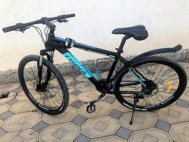 165: Горный велосипед 27.5" Trek (серия Marlin, черный с бирюзовым принтом) — 2