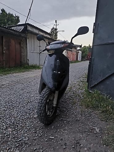 скутер большой: Скутер Honda Dio (ориентировочно 50–90 см³), чёрный. Особенности и — 1