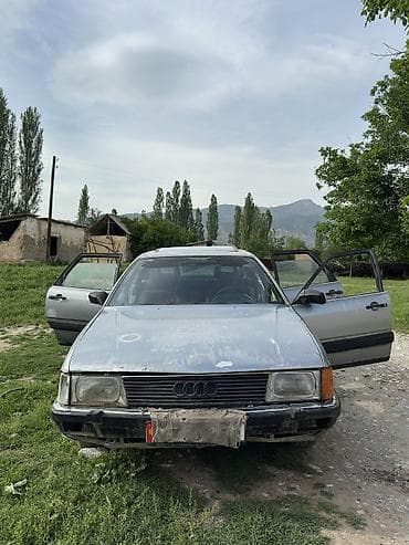 Унаа сатуу: Audi 100: 1988 г., 2 л, Кол менен иштөөчү, Бензин, Седан — 1