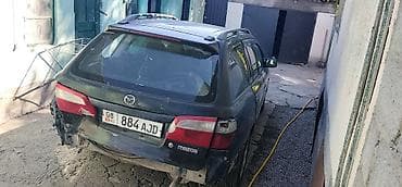Продажа авто: Mazda Familia: 1999 г., 1.5 л, Механика, Бензин, Универсал — 4