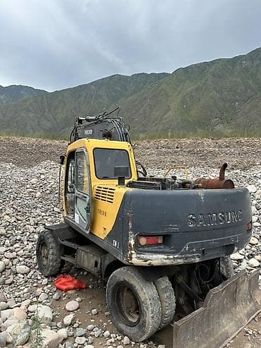 тракторный кун: Экскаватор, Volvo, 2001 г., Колесный — 5