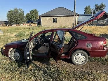 авто для такси: Mazda 626: 1994 г., 2 л, Механика, Бензин, Лифтбек — 2