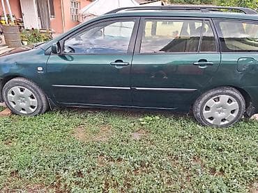 Продажа авто: Toyota Corolla: 2001 г., 1.6 л, Механика, Бензин, Универсал — 6