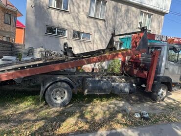 тягач двух мостовой: С гидроманипулятором — 2