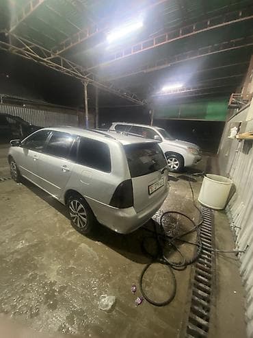 Toyota: Toyota Corolla: 2003 г., 1.5 л, Автомат, Бензин, Универсал — 9