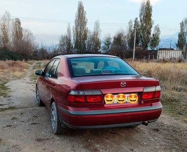 Mazda 626: 1996 г., 1.8 л, Механика, Бензиновая, Седан — 2
