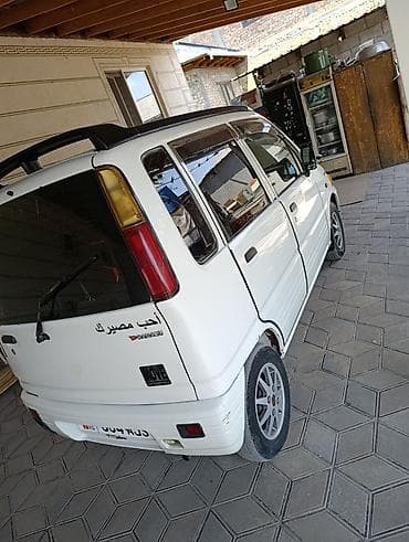 фара на ман: Daihatsu Move: 1998 г., Минивэн — 4