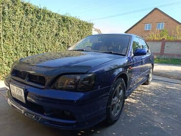 Скупка катализаторов: Седан темно-синего цвета с аэродинамическим обвесом и заниженным — 6