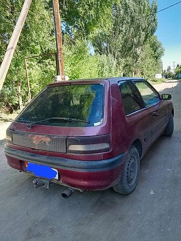нужна: Mazda 323: 1994 г., 1.3 л, Механика, Бензин, Хэтчбэк — 3