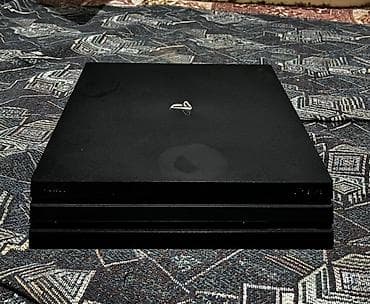 PlayStation 4 Pro (черная) Комплектация: - Консоль PS4 Pro - Два