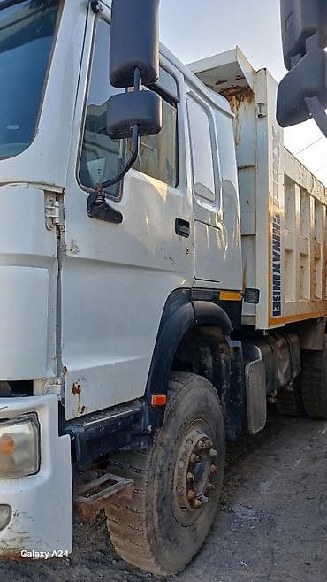 куплю мусоровоз: Самосвалы HOWO (CNHTC/SINOTRUK) 8×4 - Кузов-«ванна» большого объёма с — 8