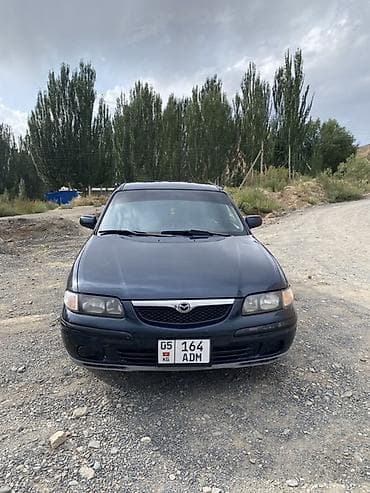 диски борбет а: Mazda 626: 1998 г., Механика, Седан — 4