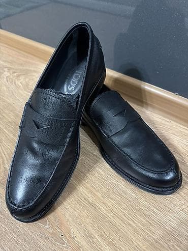 Мужские лоферы TOD’S - Классическая пара в черном цвете - Материал