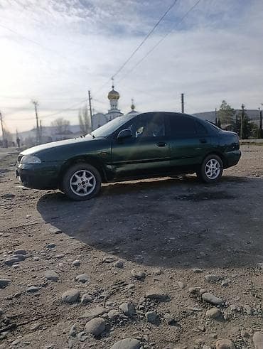 авто рага: Mitsubishi Carisma: 2000 г., 1.6 л, Кол менен иштөөчү, Бензин, Хетчбек — 10