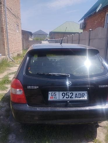 mazda 324: Mazda 323: 2002 г., 1.6 л, Механика, Бензин, Хэтчбэк — 4