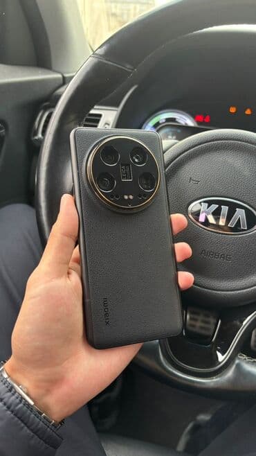 защищённый телефон: Xiaomi, 14 Ultra, Б/у, 512 ГБ, цвет - Черный, 2 SIM — 3