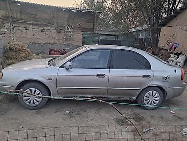 bmw e91: Kia Shuma: 2003 г., 1.6 л, Механика, Бензин — 4