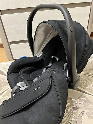 Автокресла: Автокресло-переноска Anex (группа 0+) в черном цвете. - Для — 4