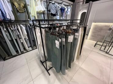 оборудование в бутик: Стеллажи для бутика одежды Кронштейны для бутика одежды Торговое — 3