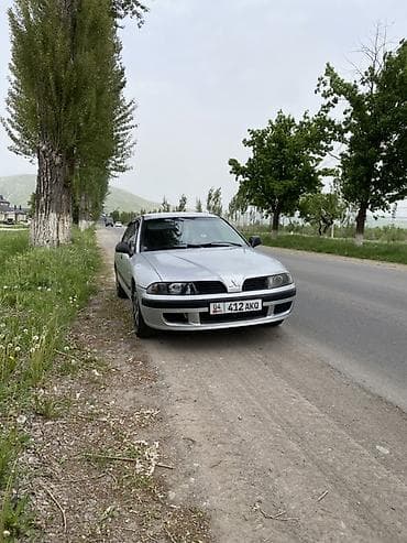 муссо санйон: Mitsubishi Carisma: 2001 г., 1.8 л, Механика, Бензин, Седан — 5