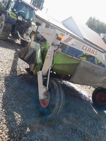 Прицепная дисковая косилка Claas Disco 3000 TC. Предназначена для