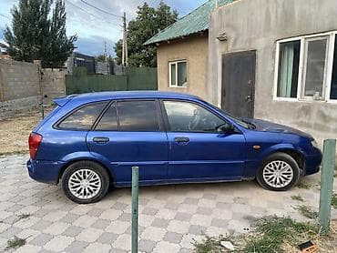 5: Mazda 323: 2003 г., 1.3 л, Механика, Бензин, Хэтчбэк — 1
