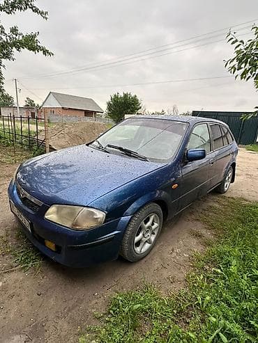 Транспорт: Mazda 323: 2001 г., 1.6 л, Кол менен иштөөчү, Бензин, Хетчбек — 2